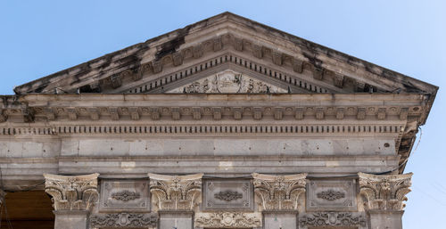 Low angle view of historical building against clear sky