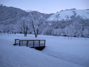 Scenic view of snow covered mountains