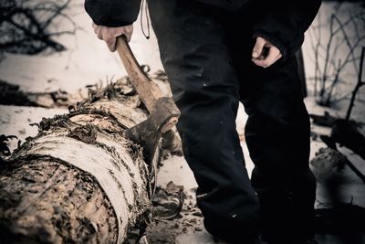 Low section of people standing on field