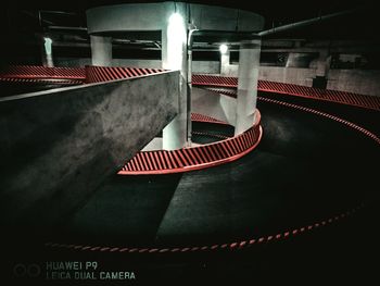 High angle view of illuminated staircase in parking lot