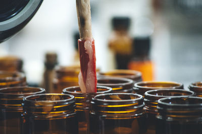 Close-up of salve in bottle