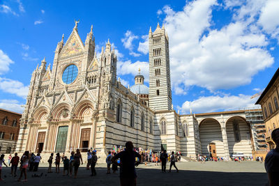 Group of people in front of  siena cathedral