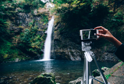 Scenic view of waterfall in forest