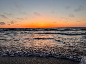 Scenic view of sea against sky during sunset