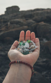 Close-up of hand holding rock