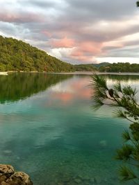 View of lake against cloudy sky