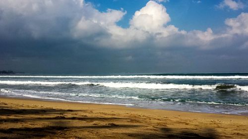 Scenic view of beach against sky