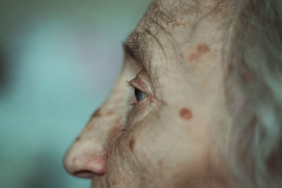 Close-up of senior woman looking away