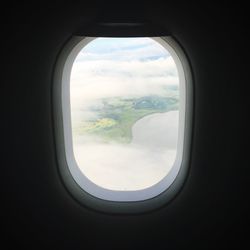 View of landscape seen through window