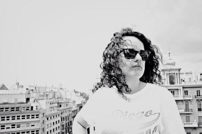 Portrait of young woman on rooftop