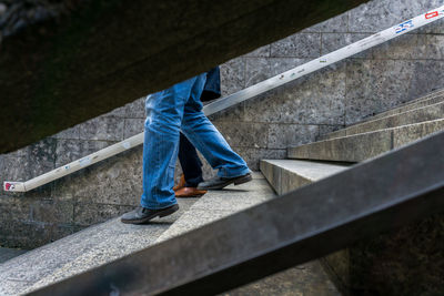 People moving down on stairs