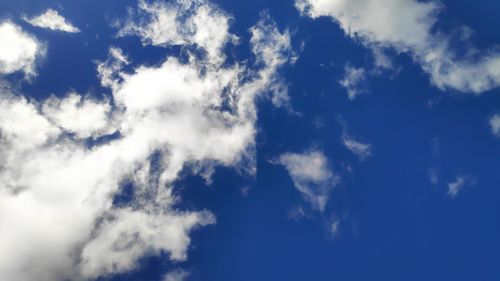 Low angle view of clouds in blue sky