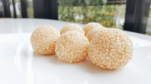 Close-up of sesame balls in plate