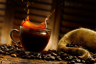 Close-up of coffee beans on table