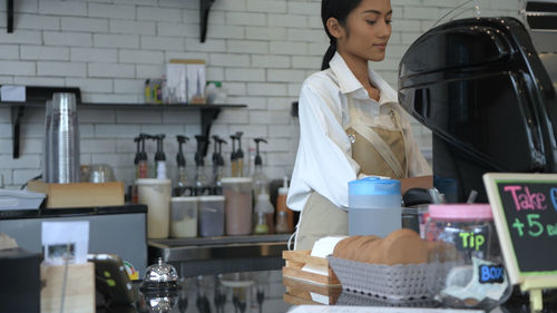 Barista working at coffee shop