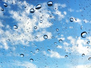 Close-up of water drops on glass