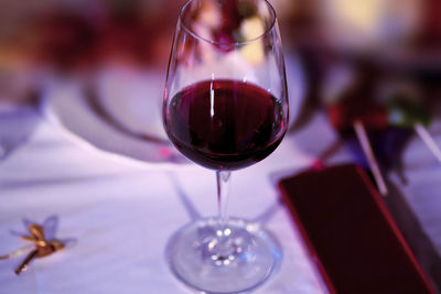 Close-up of wine glass on table