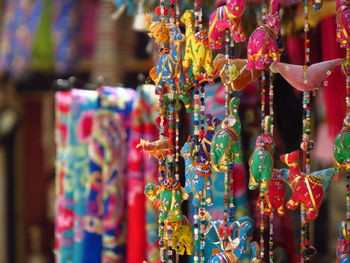 Colorful decorations hanging for sale at market