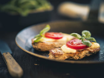 Close-up of food served in plate on table