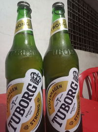 High angle view of beer bottles on table