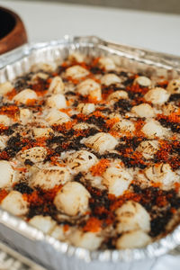 Close-up of pizza served on table