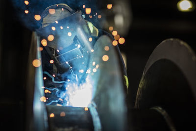 Welder working in factory workshop