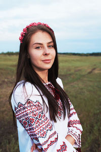 Beautiful caucasian woman in a folk costume