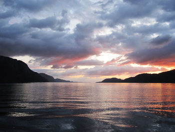 Scenic view of sea against dramatic sky