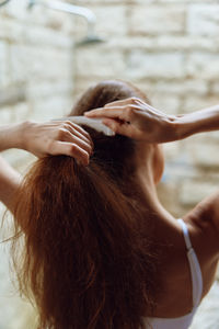 Rear view of woman looking away