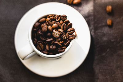 High angle view of coffee cup on table