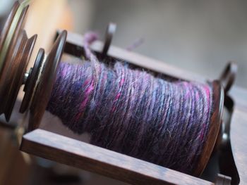 Close-up of bobbin and flyer of the spinning wheel