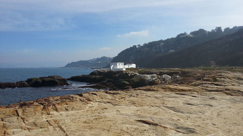 Scenic view of beach against sky