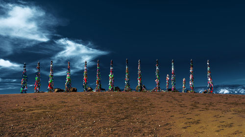 Lifeguard hut on beach against sky