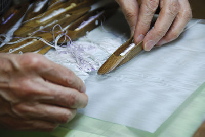 Close-up of hands working