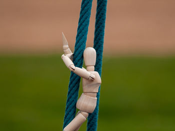 Figurine on rope