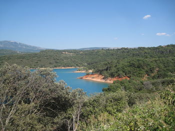 Scenic view of sea against clear blue sky