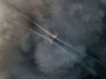 Birds view of a bridge in the fog