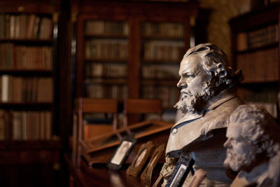 Close-up of statue on table