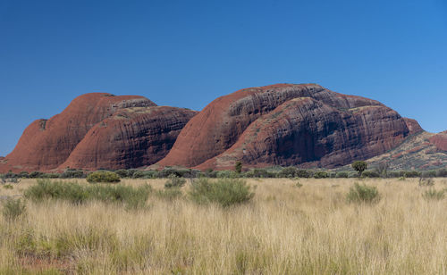 Scenic view of rocky mountains against clear sky