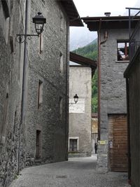 Houses in town against sky