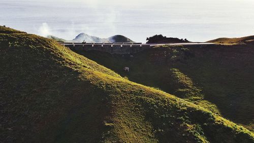 View of hill against sky