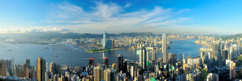 High angle view of cityscape against cloudy sky