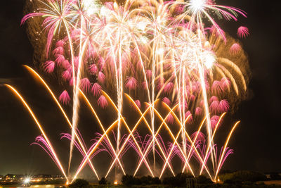 Firework display at night