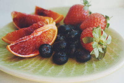 Close-up of fresh fruits on plate