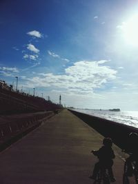 Scenic view of sea against cloudy sky