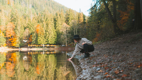 Scenic view of lake by trees during autumn