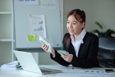 Businesswoman working at office