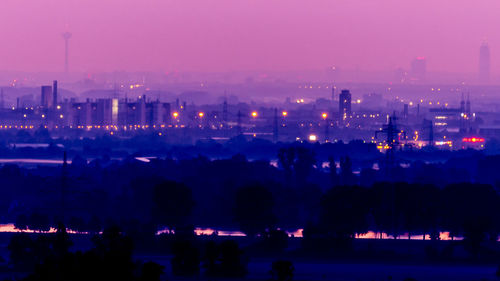 Panoramic view of city at night