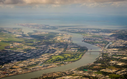 Aerial view of city against sky