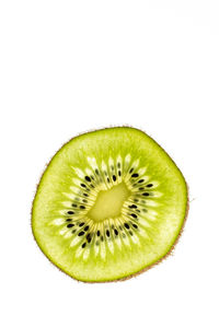 Close-up of fruit over white background